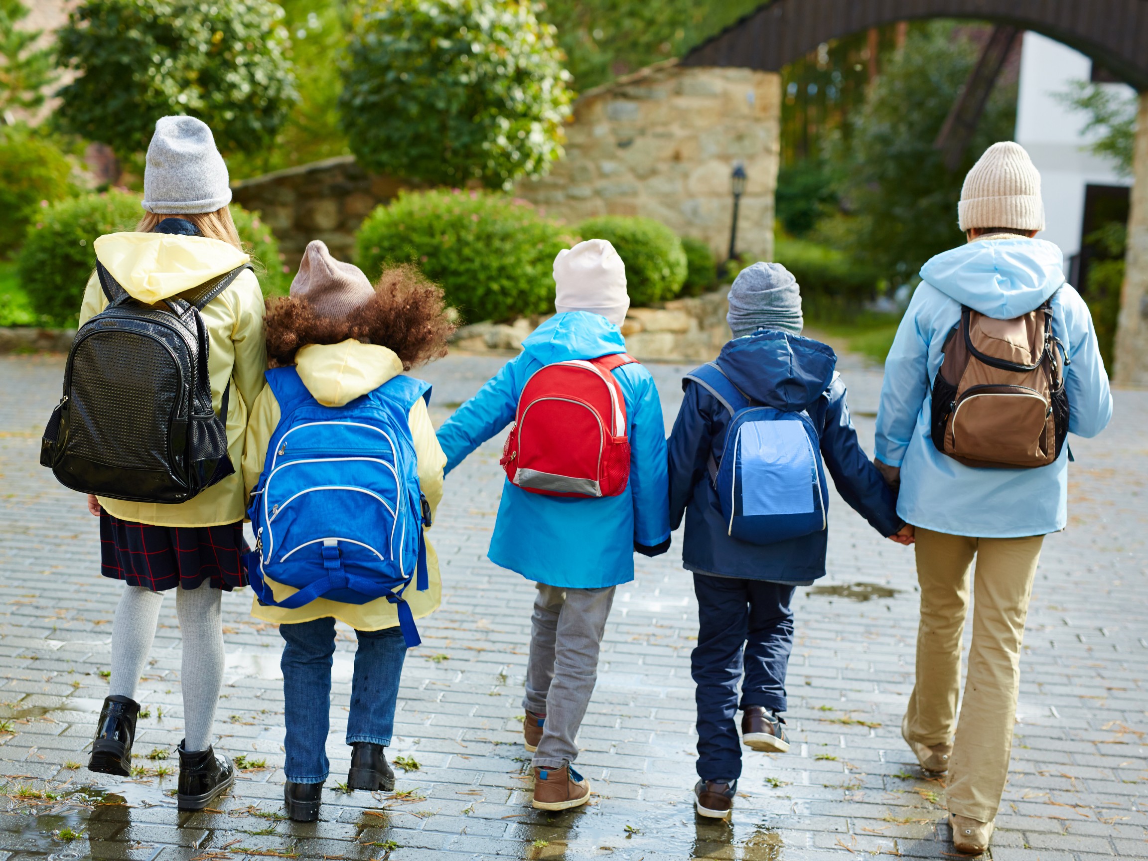 kids wearing backpacks